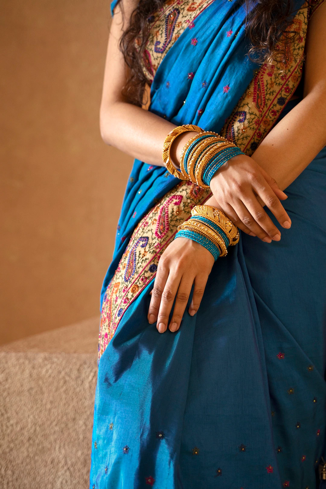 young-indian-woman-wearing-sari_23-2149400904